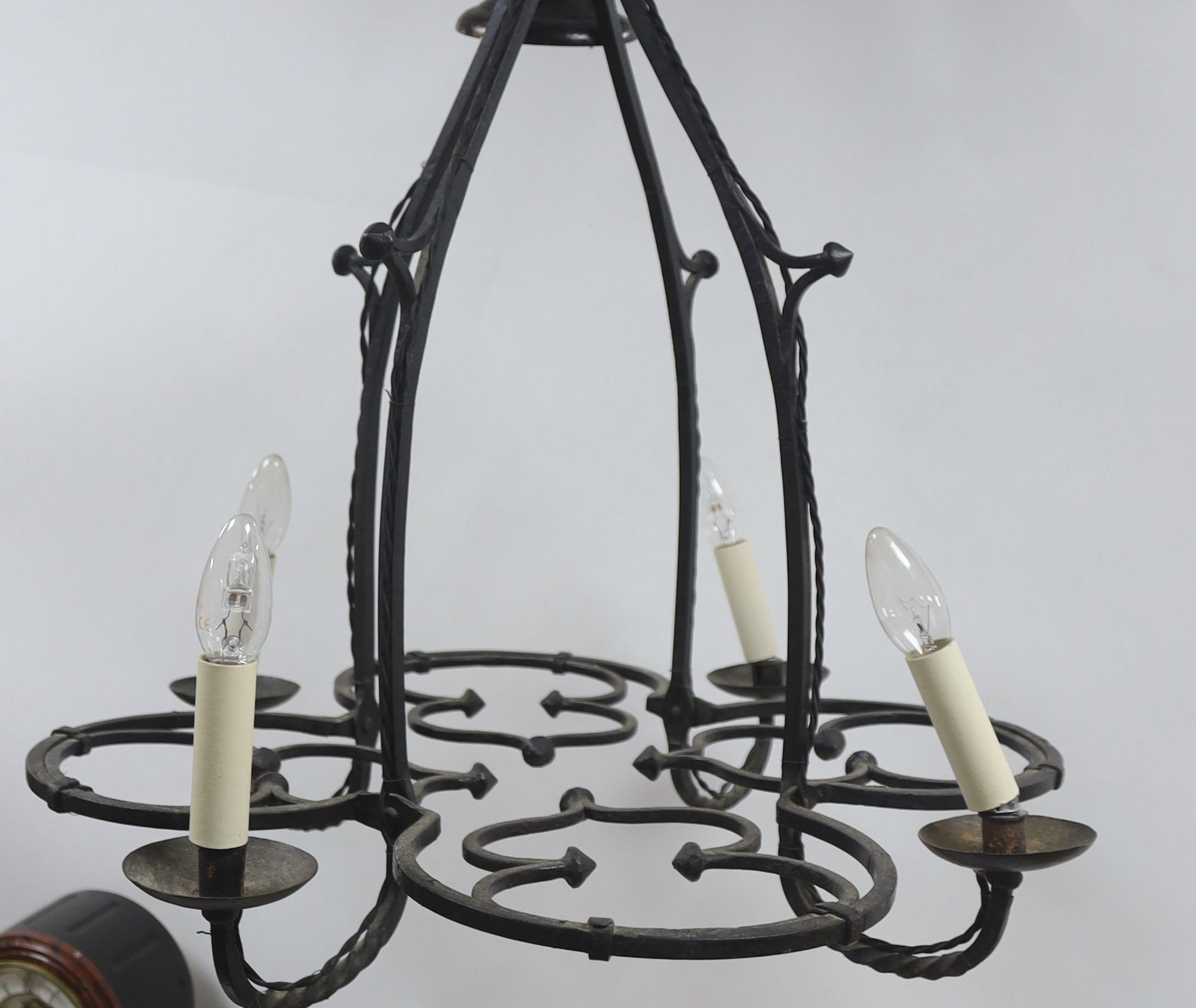 A wrought iron 4 light chandelier 80x63cm